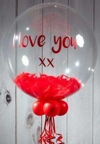 Love you printed on bubble transparent balloon with petals inside and 3 red balloons