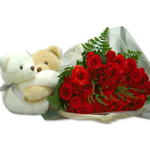 2 teddies with 12 red roses