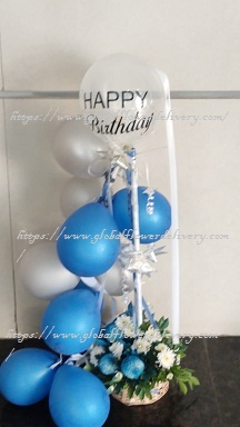 Blue silver air balloons arrangement with roses and happy birthday balloon