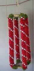 2 garlands with red and white flowers and beads