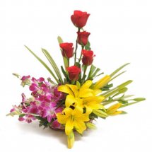 Basket of 5 red roses 3 Purple Orchids and 2 Yellow Lily