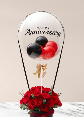 Happy transparent printed transparent balloon with 4 black and red air balloons and 20 red roses arrangement